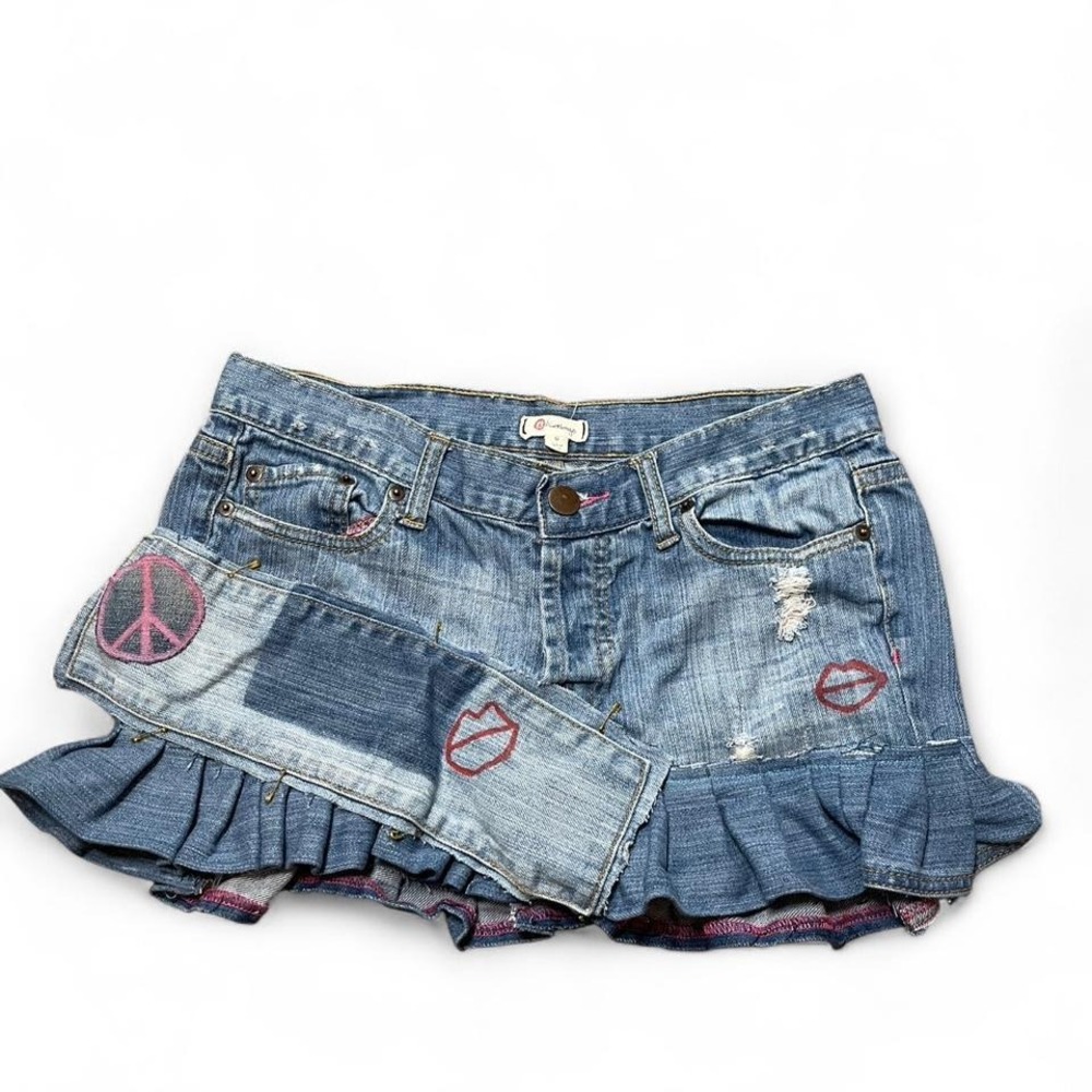 upcycled custom denim mini skirt with peace sign and lips designs